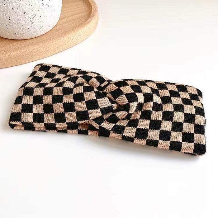 Flat lay of Checkered Twist Headband in brown, easy for workdays and special occasions.