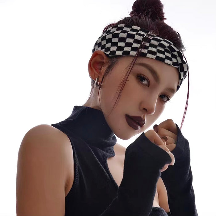 Model wearing Checkered Twist Headband in black, great for everyday styling and gifting.