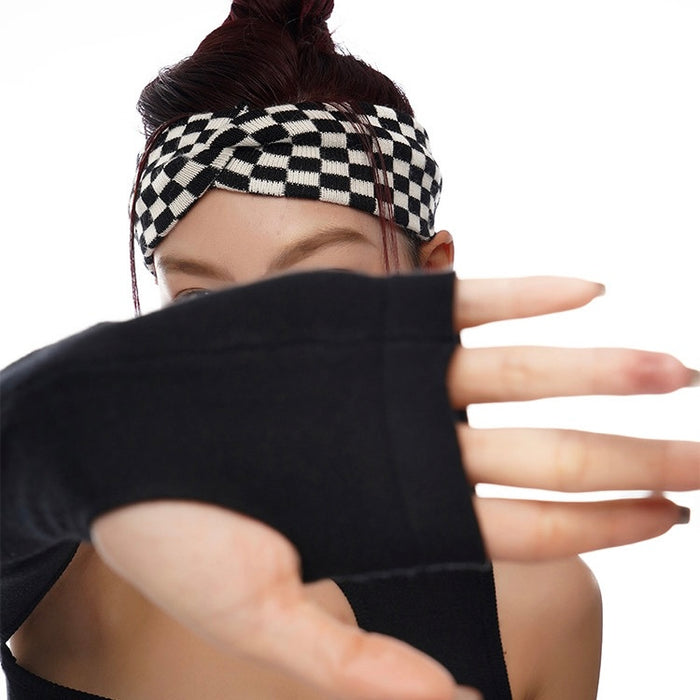 Angled view of Checkered Twist Headband in black, easy for workdays and special occasions.