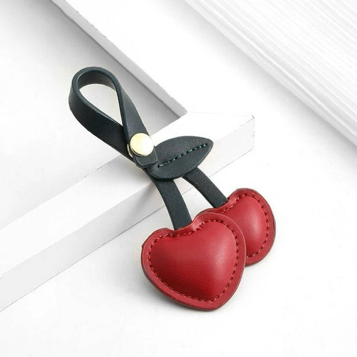 Front view of Cherry Bag Charm, ideal for everyday outfits and street style.