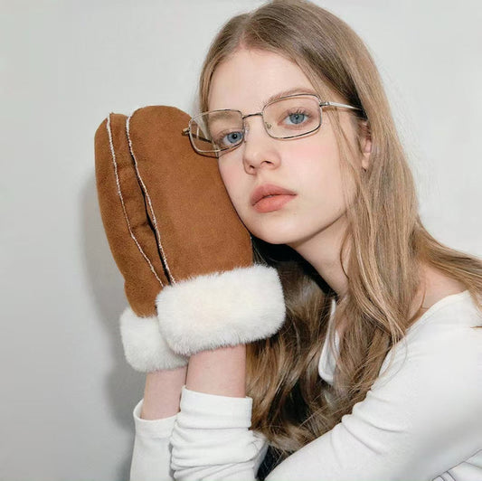 Chestnut suede gloves shown on model hands; smooth suede texture for winter street wear and commuting.