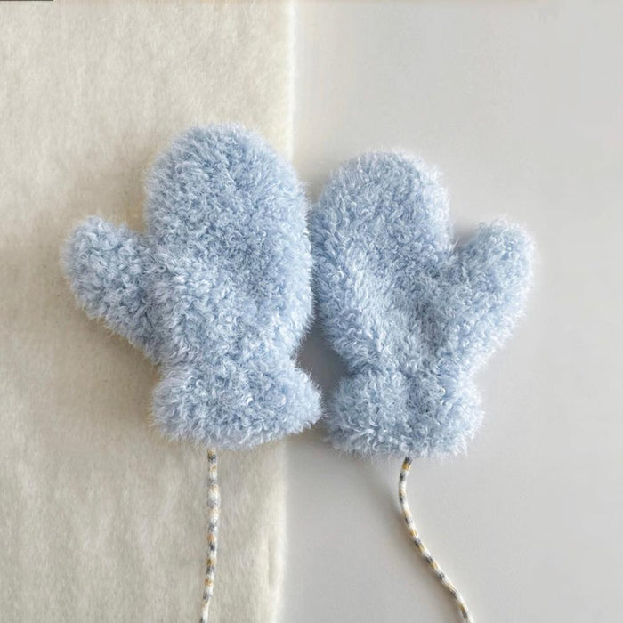 Blue cloud-touch fluffy gloves with soft plush texture; cozy winter accessory for everyday wear.