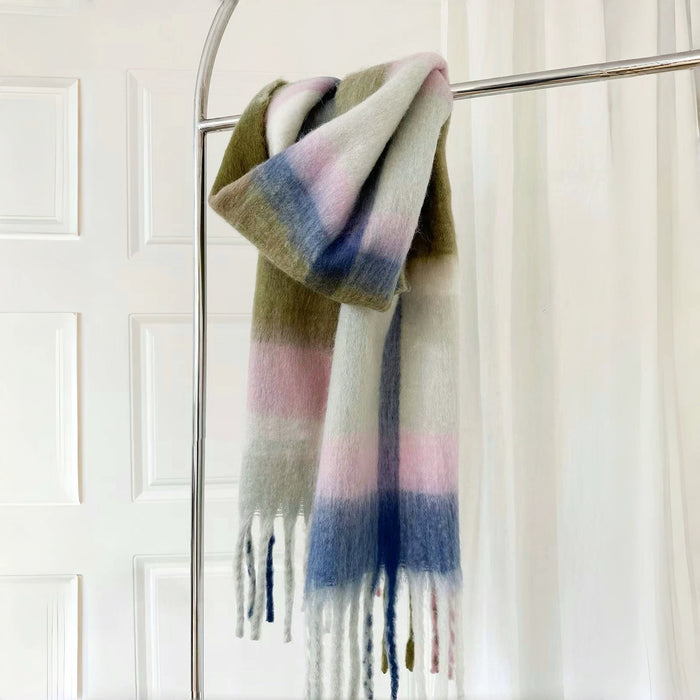 Flat lay of Cloudy Pastel Scarf, great for office layering and commuting.