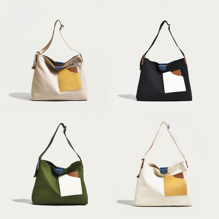Four-color collection of heavy-duty cotton canvas tote bags with leather trim for office commutes.