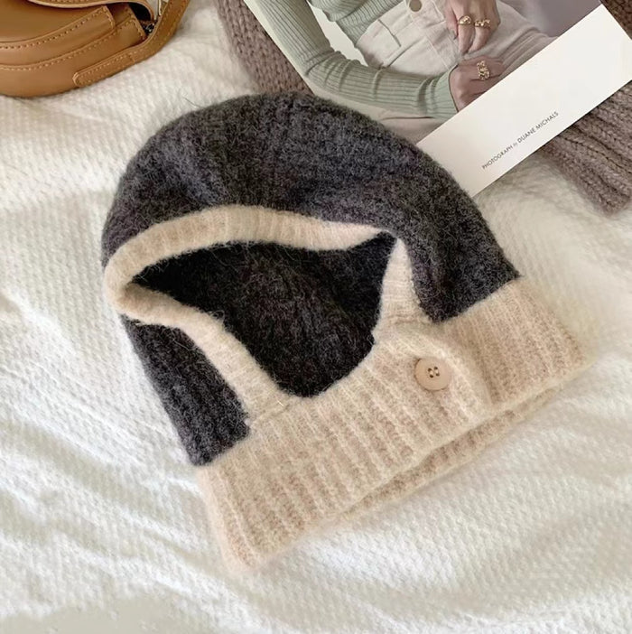 Dark grey and beige wool-acrylic color-splicing balaclava hat with a decorative button accent.