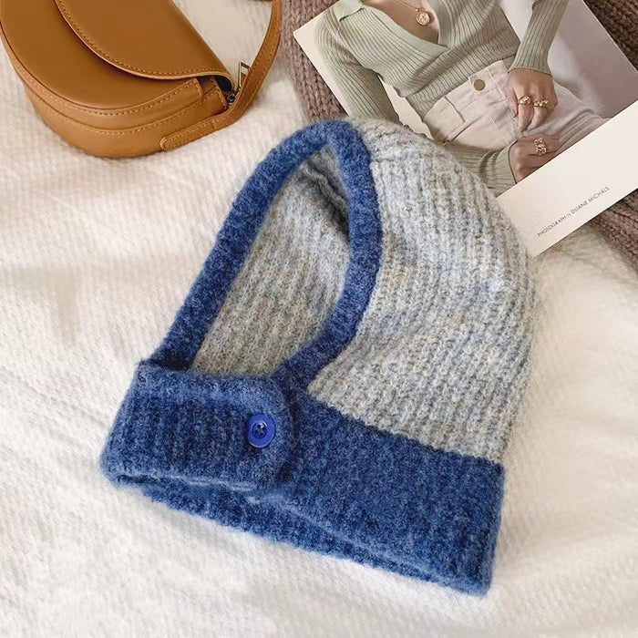 Front view of light grey-blue balaclava hat, featuring premium color-blocked panels for winter protection.