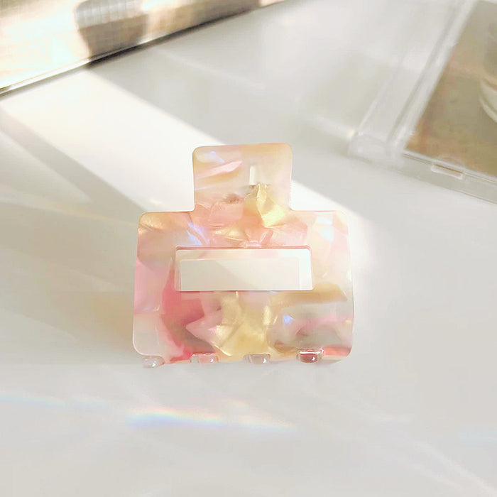 Front view of Color Square Hair Claw in pink, easy for workdays and special occasions.