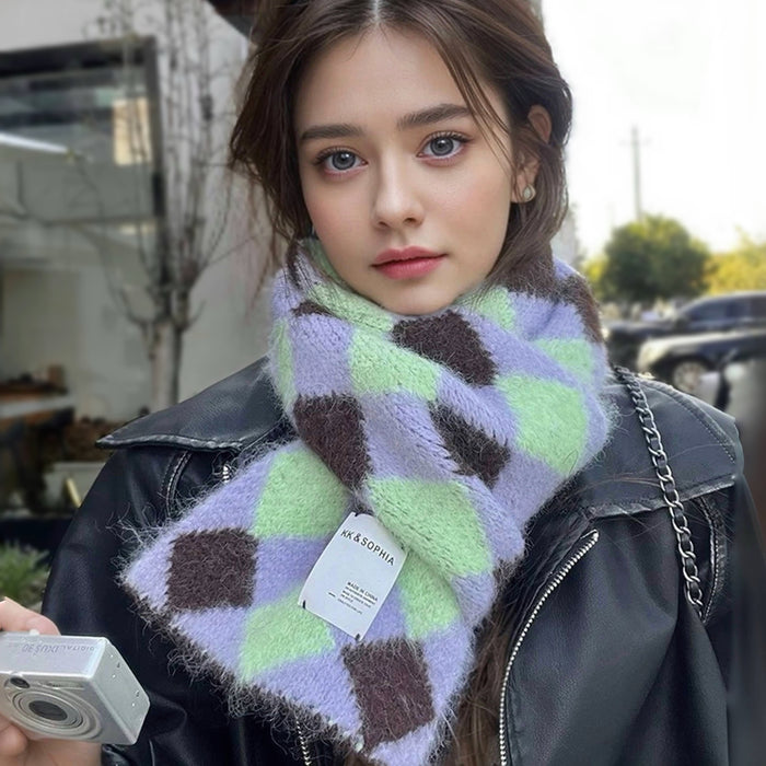 Model wearing a wool scarf in brown and purple, easy for weekend styling and gifting.