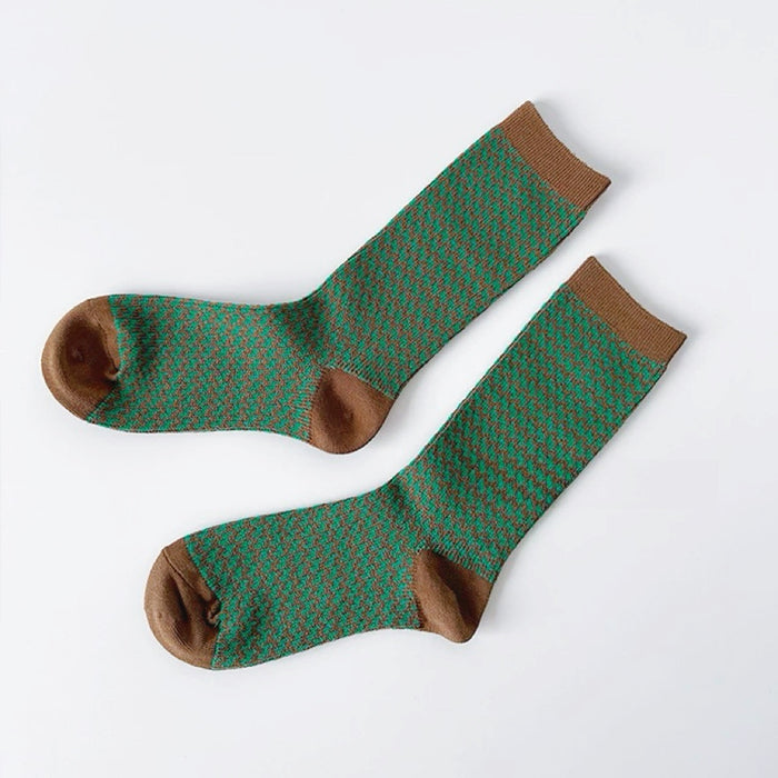Folded view of Colored Houndstooth Socks in green, ideal for workouts and commuting.