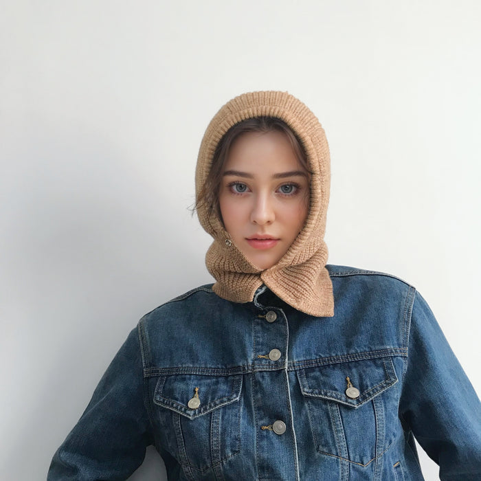 Model wearing khaki balaclava hat with multi-tone patterns, highlighting high-quality craftsmanship.