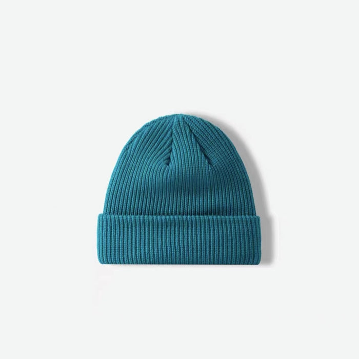 Front view of peacock blue multi-color beanie. Rich oceanic hues for a bold cold-weather fashion statement.