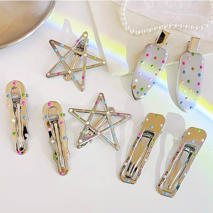 Angled view of4 pairs of Colorful Polka Dot Hair Clip with different shapes.
