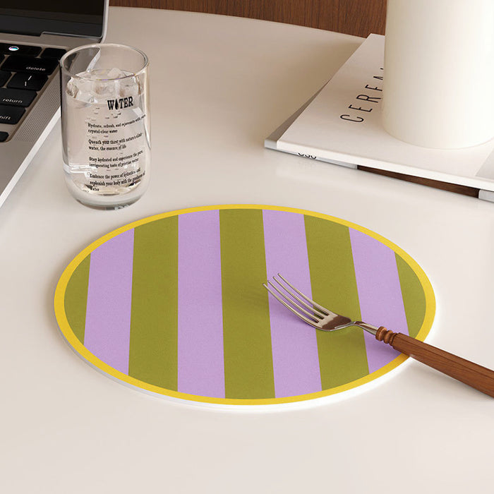 Flat lay of Colorful Striped Coaster/Hot Pad product in purple and green , great for home decor.