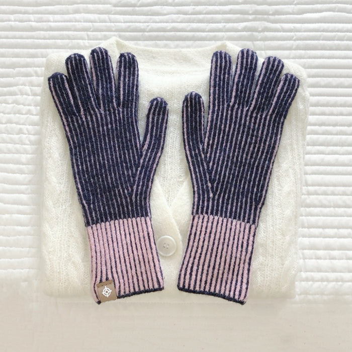 Purple contrast striped knit gloves with ribbed cuffs; cozy accessory for winter outfits.