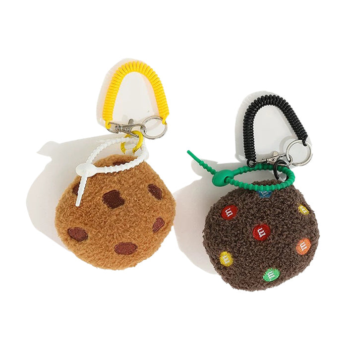Two fluffy polyester cookie bag charms: one light brown with chocolate chips and one dark brown.