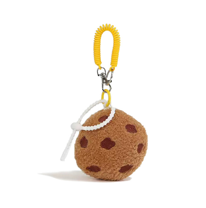 Flat lay of Cookie Bag Charm in light brown, great for everyday styling and gifting.