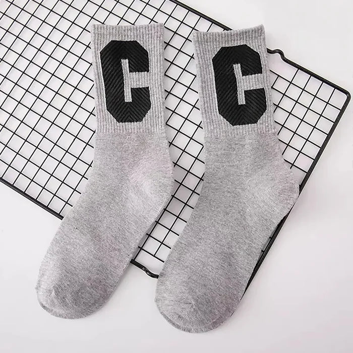 Close-up of Cool C Socks in gray, ideal for workouts and commuting.
