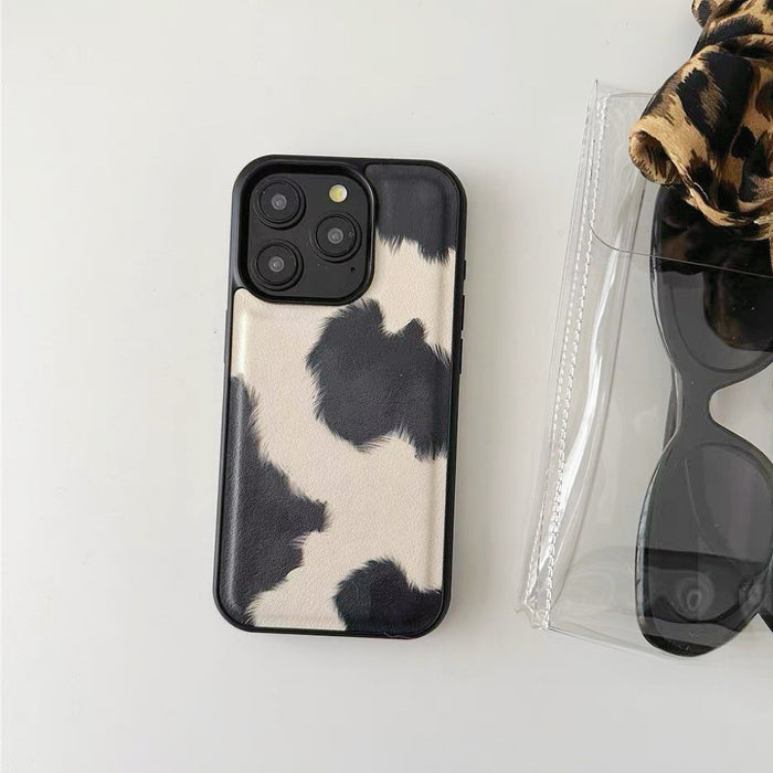 Front view of Cow Print Leather Case. Trendy graphic aesthetic for an instant minimalist style statement.
