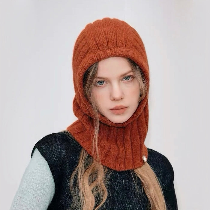 Rust orange balaclava hat crafted from premium 20% wool blend, featuring a soft ribbed texture.