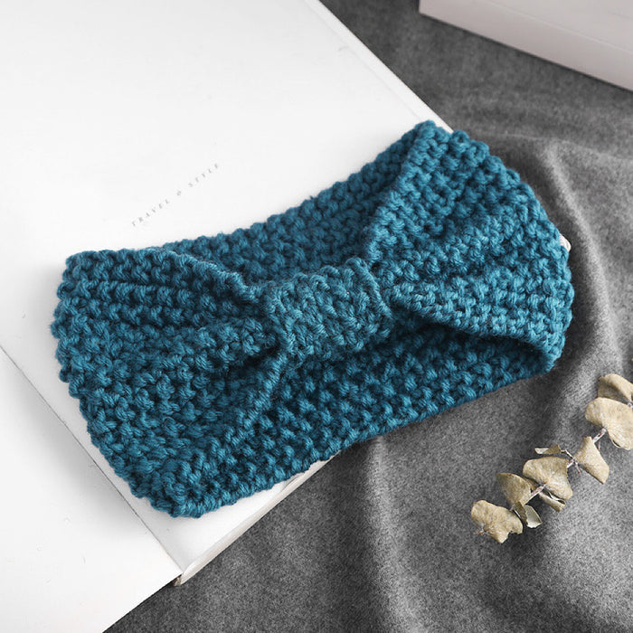 Angled view of Crochect Bow Headband in blue, great for everyday styling and gifting.