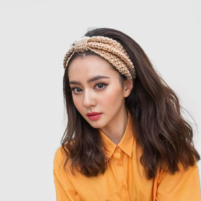 Model wearing a khaki Crochect Bow Headband, easy for workdays and special occasions.