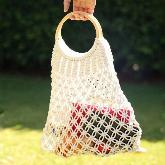 Close-up of Crochet Handbag With Wooden Ring in white, easy for commuting and weekends.