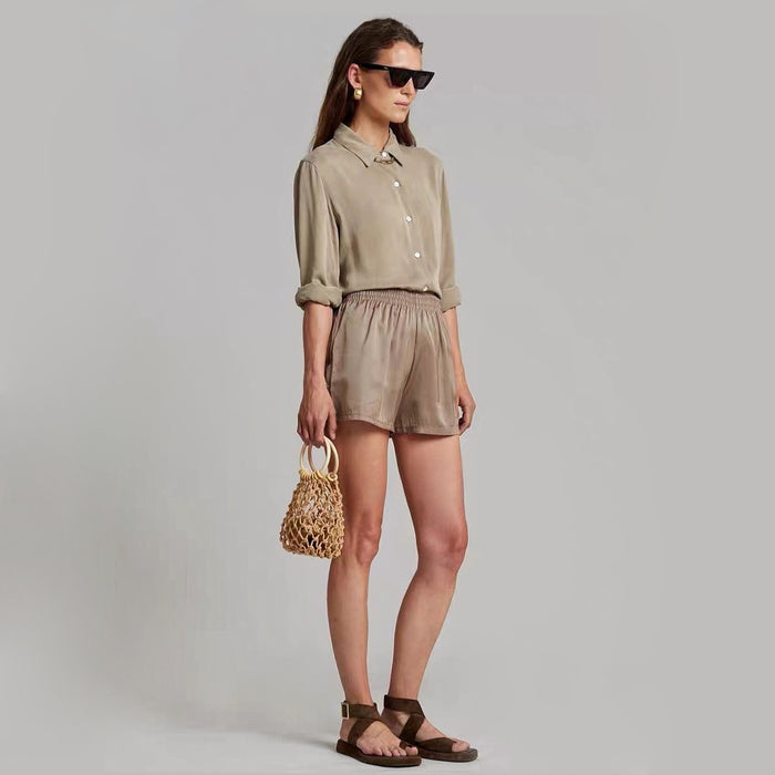Model carrying a Crochet Mini Handbag With Wooden Ring, easy for commuting and weekends.