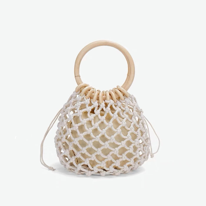 Folded view of Crochet Mini Handbag With Wooden Ring in white, easy for commuting and weekends.