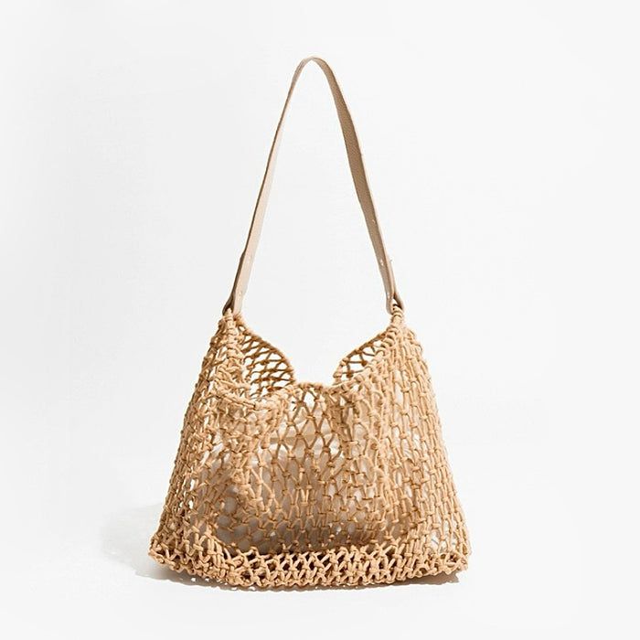 Flat lay of Crochet Shoulder Bag With Leather Strap in camel, great for everyday carry and travel.