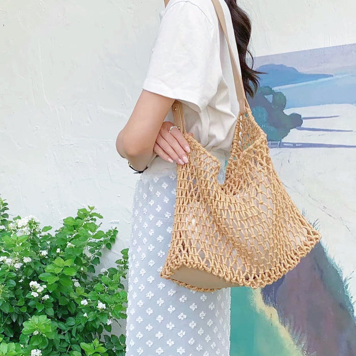 Model carrying a camel Crochet Shoulder Bag With Leather Strap, easy for commuting.