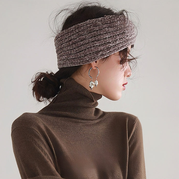 Model wearing a Crochet Velvet Twist Headband in rosy brown , ideal for quick updos and ponytails.