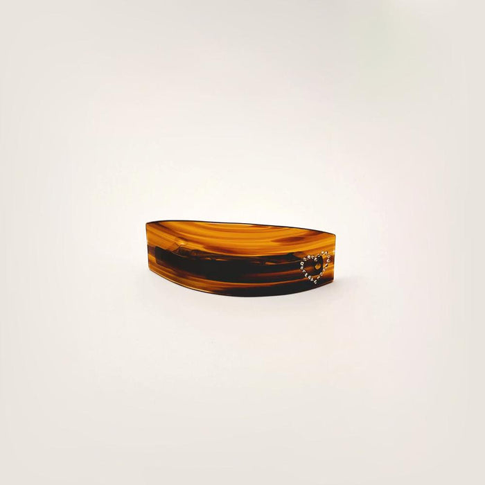 Angled view of Curved Hairpin With Rhinestones, ideal for quick updos and ponytails.