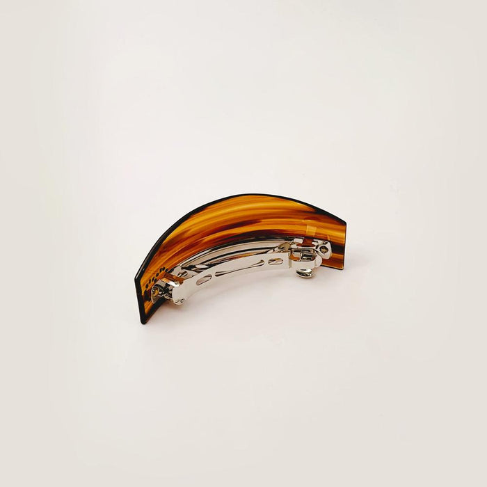 Close-up of Curved Hairpin With Rhinestones, easy for workdays and special occasions.
