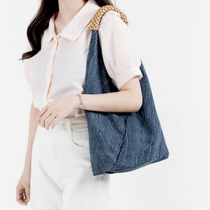 Model carrying a dark blue Denim Shoulder Bag on the shoulder, ideal for city walks and gifting.