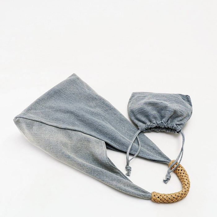Front view of light blue Denim Shoulder Bag With Inner Pouc, great for everyday carry and travel.