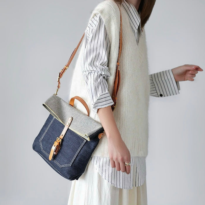 Model carrying a Denim Trimmed Messenger Bag on her shoulder, easy for commuting and weekends.