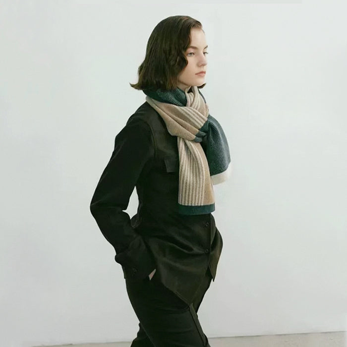 Model wearing a striped scarf Designer Soft Striped Scarf in green, easy for weekend styling and gifting.