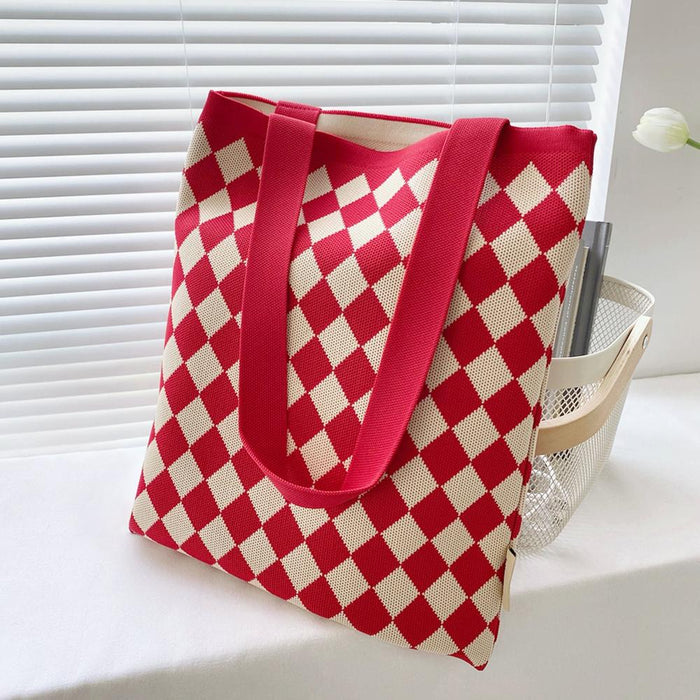 Flat lay of Diamond Knitted Tote Bag in red, great for everyday carry and travel.