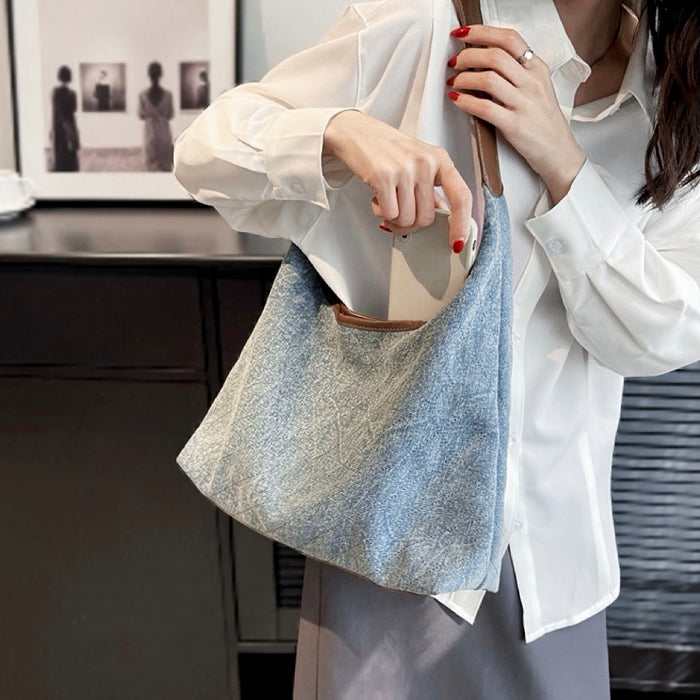 Model carrying a light blue Diamond pattern Denim Shoulder Bag on shoulder, easy for commuting and weekends.