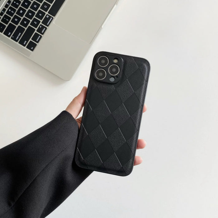 Model holding black Diamond Pattern Leather Case. Elegant embossed diamond-quilt for Old Money style.