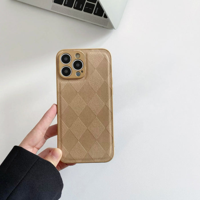 Model holding khaki Diamond Pattern Leather Case. Sophisticated embossed texture for chic professional outfits.