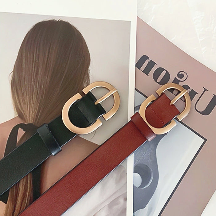 Two PU leather Double C Lady's Belts, one black and one brown, with gold oval buckles.