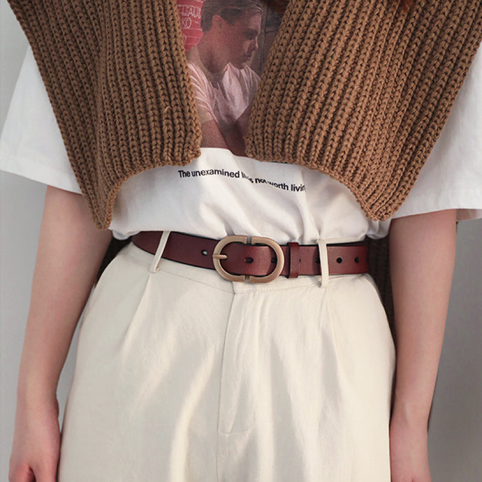 Model wearing brown Double C Lady's Belt, casual fashion for jeans matching