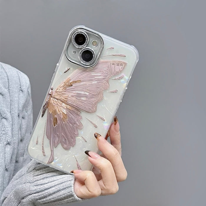 Close-up of woman holding Dreamy Butterfly Phone Case, showcasing the 3D texture and sparkling camera lens protector.
