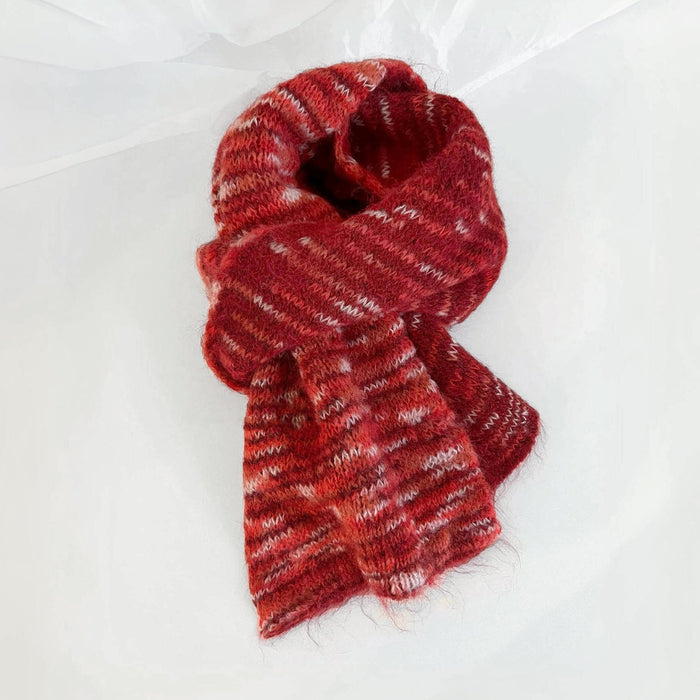 Close-up of Dual-Sided Aurora Texture Soft Scarf in burgundy and red, easy for travel packing and gifting.