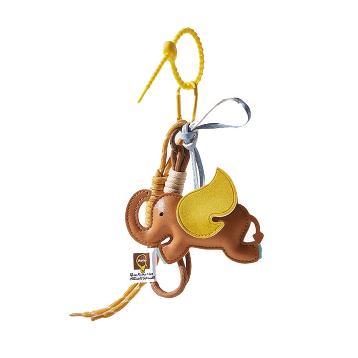 Front view of Brown PU leather Dumbo bag charm with yellow wings, blue and white ribbons, and a yellow plastic loop.