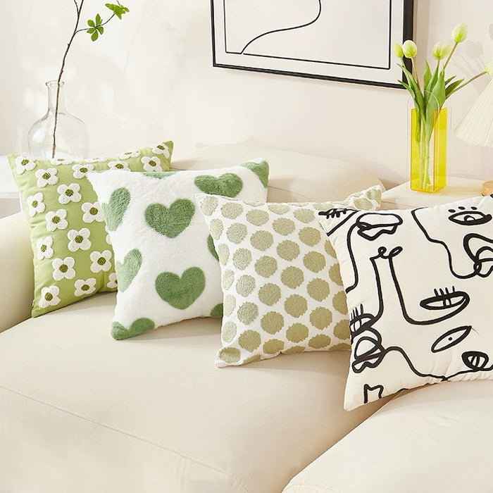 Angled view of 4 pieces Elegant Vibe Pillow Cover  shown together on the couch.