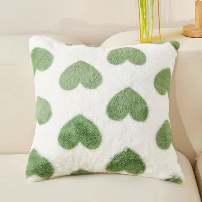 Folded view of Elegant Vibe Pillow Cover with hearts pattern.