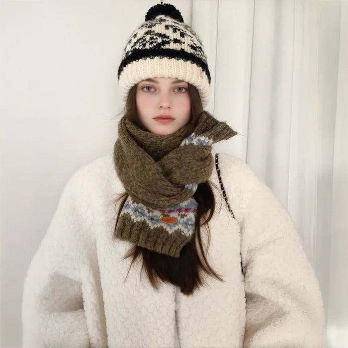 Model wearing cozy Fair Isle pattern wool-acrylic scarf in olive green with blue and red accents.