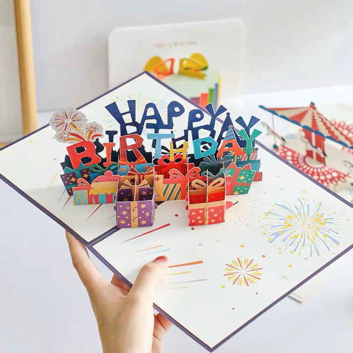 Model Hands holding a Fireworks Birthday Card, showcasing the details.